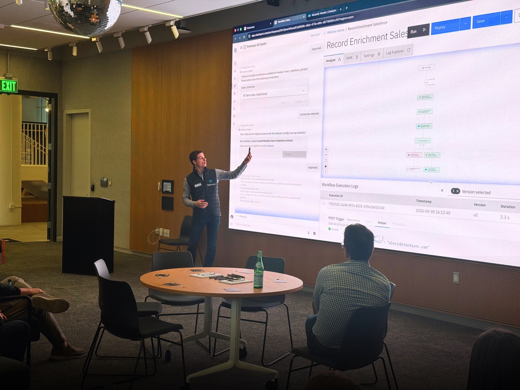 A Stacksync presenter demonstrating a live workflow to attendees.